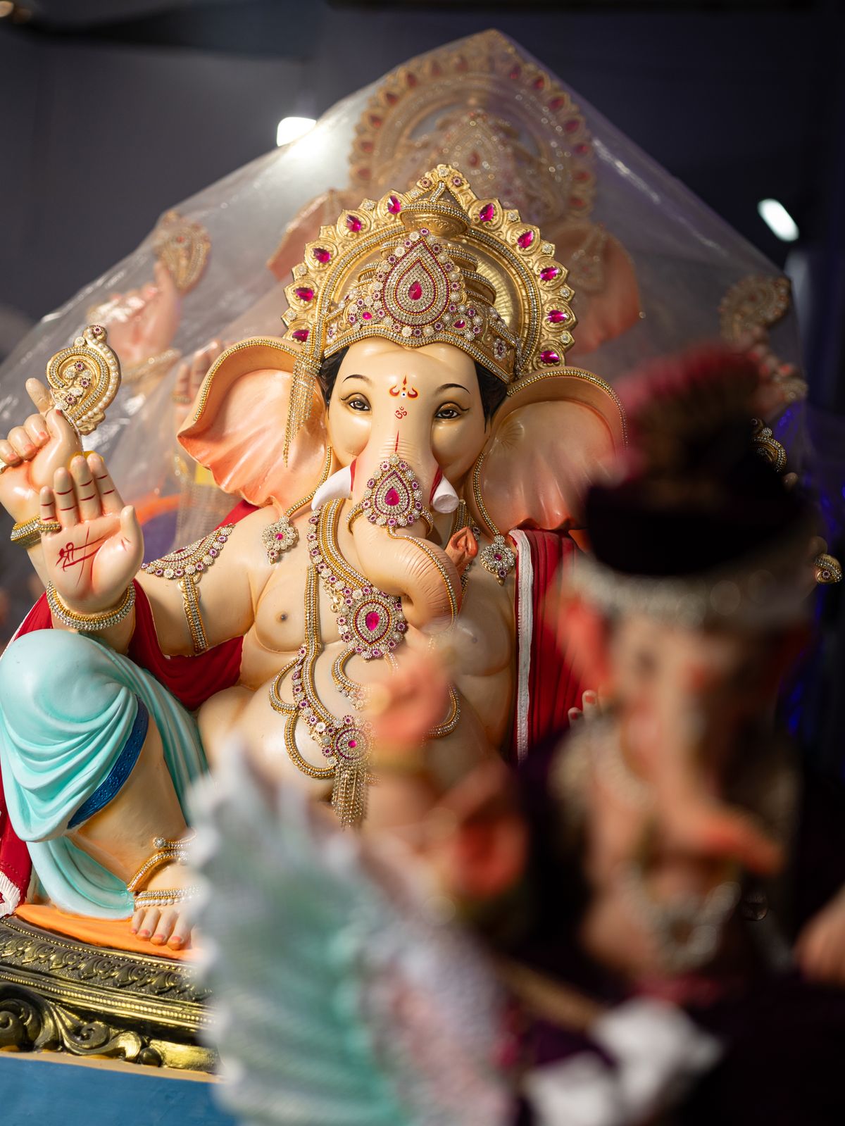 Ganesh idol adorned in gold